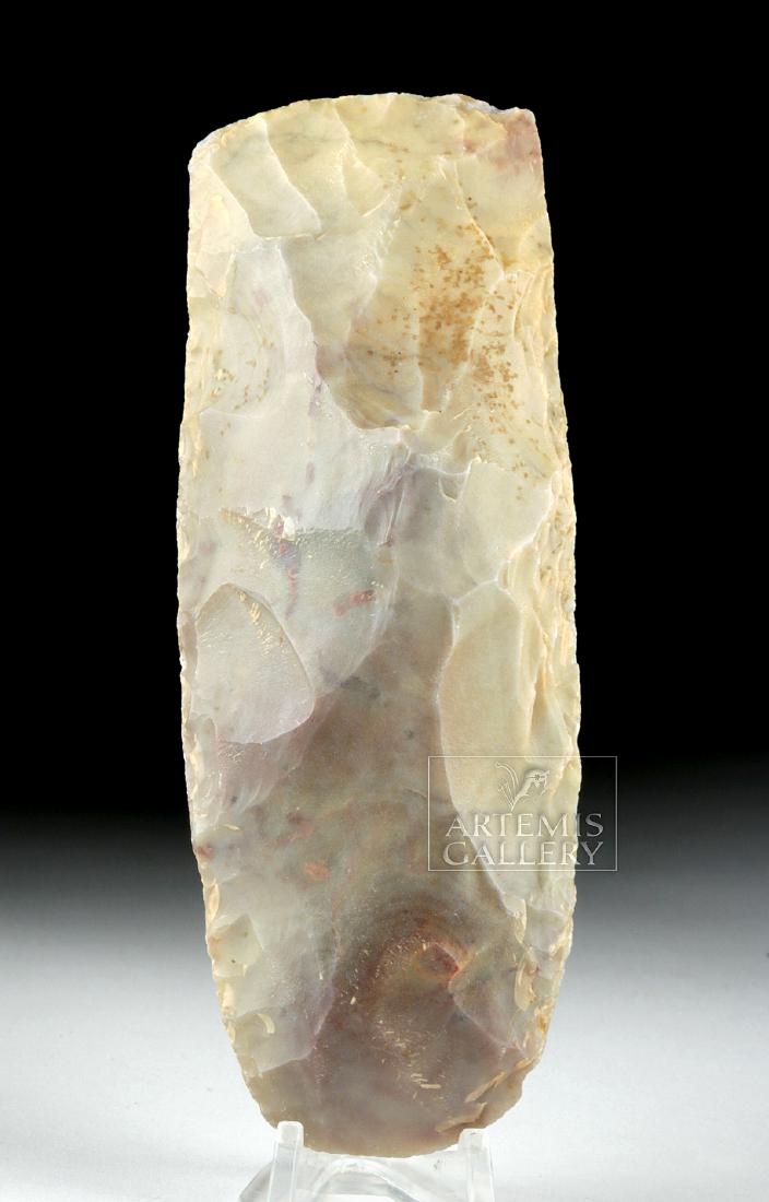 Neolithic African Sahara Desert Stone Axe: North Africa, Sahara Desert, Middle to Late Stone Age, ca. 150,000 to 10,000 years ago. Knapped from a large piece of chert, which ranges in color from grey to purple to red to beige, this is a nice h