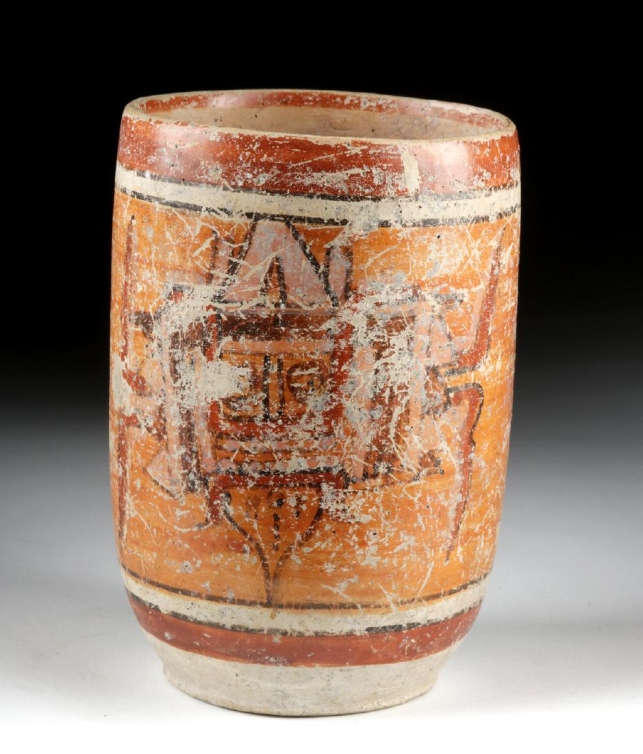 Maya Peten Pottery Vessel: Pre-Columbian, Mayan Territories, Peten Basin, Late Classic Period, ca. 550 to 900 CE. A ritual ceramic vessel with wonderful decoration, repeated twice, of a mythological creature with human-like eye