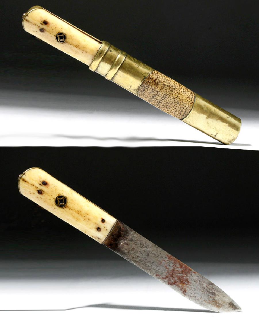 19th C. Mongolian Bone / Shagreen Knife: **Originally Listed At $300** Central Asia, Mongolia, 19th century CE. A steel knife, sharpened on one side, with a bone handle and a sheath of brass and shagreen. The knife itself is unadorned and ut
