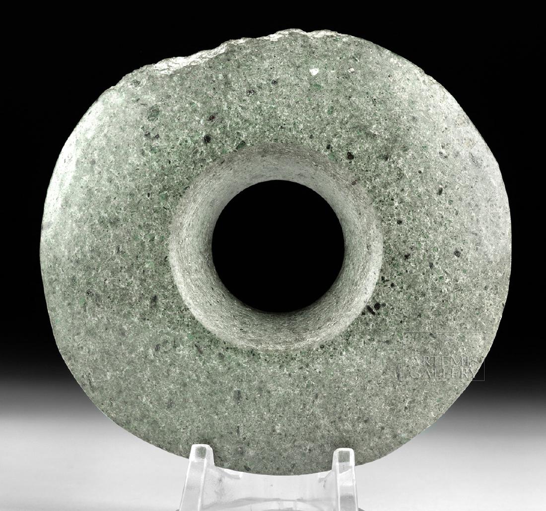 Pre-Columbian Mezcala Guerrero Greenstone Earspool: Pre-Columbian, Mexico, Guerrero/Mezcala culture, ca. 500 BCE to 500 CE. One large greenstone earspool/ear plug with a characteristically flared flat trumpet shape and two perforations to either side o