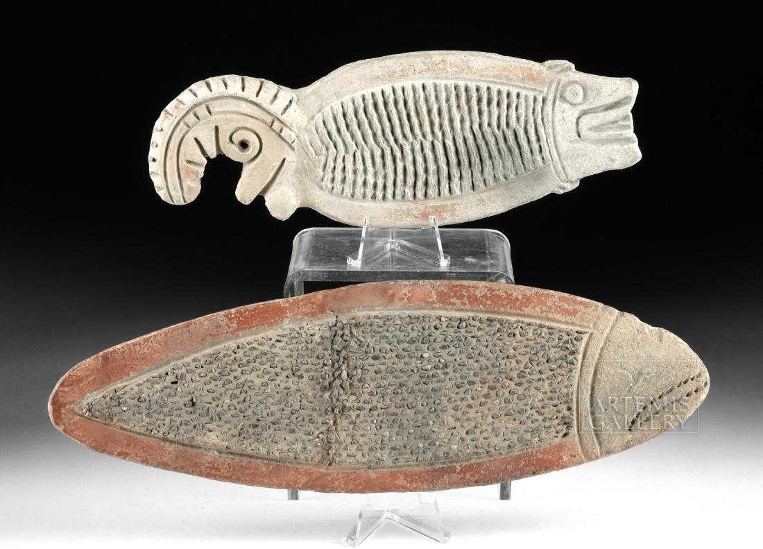 Lot of 2 La Tolita Pottery & Stone Fish Graters: Pre-Columbian, Colombia, Tumaco region, La Tolita/Tumaco culture, ca. 500 BCE to 500 CE. A fine gathering of 2 hand-built pottery effigy graters (known as "rollador") of attractive fish forms. The lar