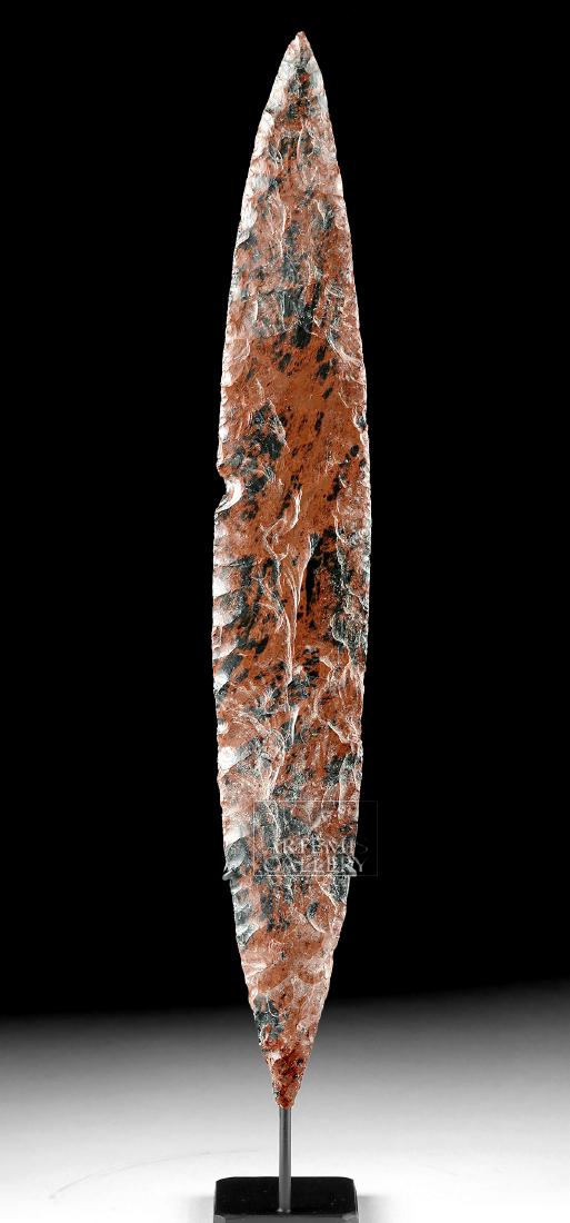 Colima Mahogany Obsidian Ceremonial Blade: Pre-Columbian, West Mexico, Colima, ca. 300 BCE to 300 CE. A beautiful stone spear point created from a gorgeous chunk of mahogany obsidian (volcanic glass with iron inclusions). The piece is well-cra