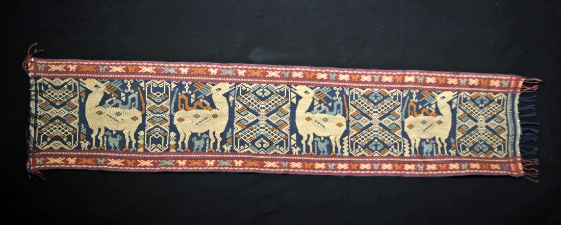 20th C. Indonesian Sumba Textile w/ Deer: Southeast Asia, Eastern Indonesia, Sumba Island, ca. late 20th century. A stunning textile with iconographic and decorative patterns created via a technique known as supplementary warp weaving which i