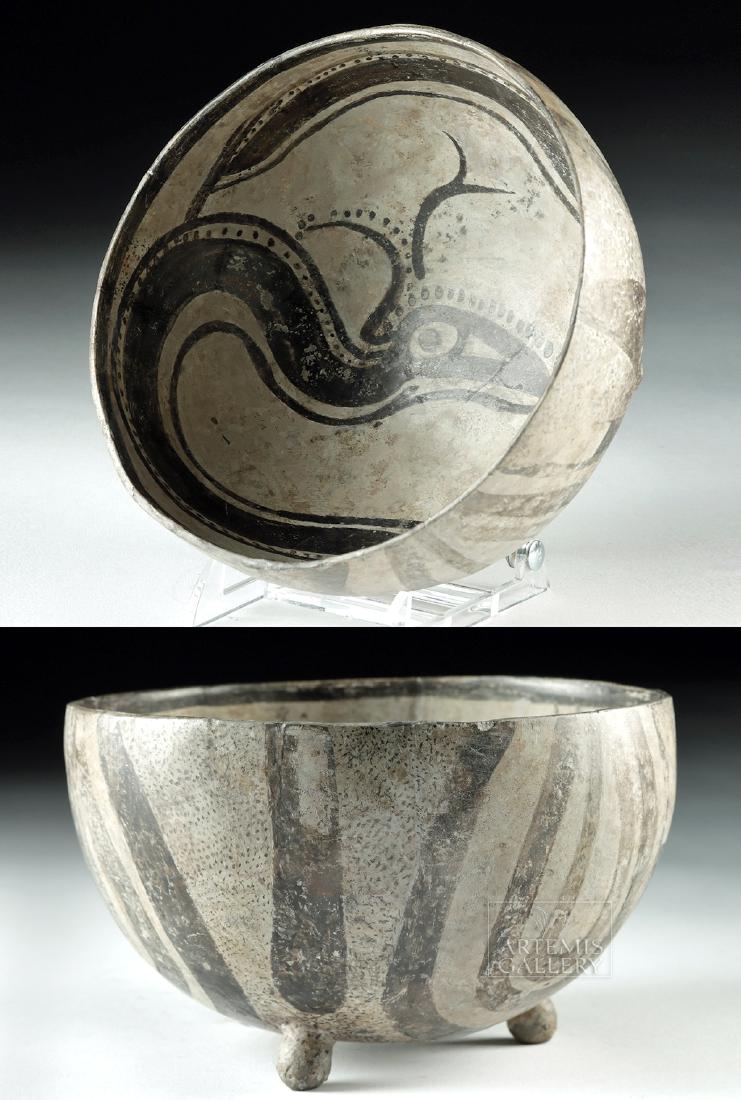 Rare Veracruz Creamware Pottery Vessel w/ Serpent: Pre-Columbian, Gulf Coast of Mexico, Veracruz culture, ca. 500 to 700 CE. A rare deep-walled bowl standing on three short, nubbin feet, its creamware surface decorated with sinuous, thick black lines