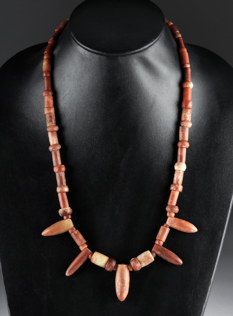 Tairona Carnelian Necklace - "Bullet" Beads: **Originally Listed At $300** Pre-Columbian, Columbia, Tairona, ca. 1000 to 1300 CE. An exquisite necklace of carnelian beads - dozens of hand-polished, hand-cut, and hand-drilled beads, featuring 5 o