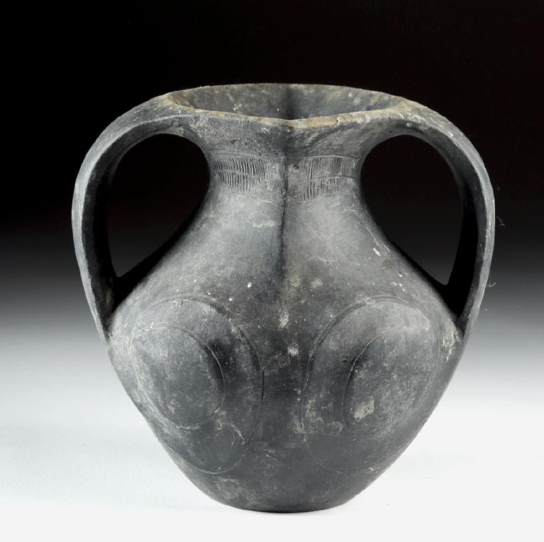 Chinese Han Dynasty Lifan Pottery Amphora w/ TL: **Originally Listed At $600** East Asia, Western China, Han Dynasty, ca. 2nd century BCE. A dark-grey earthenware vessel of an incredibly distinctive form. Panels of incised linear decorations adorn t
