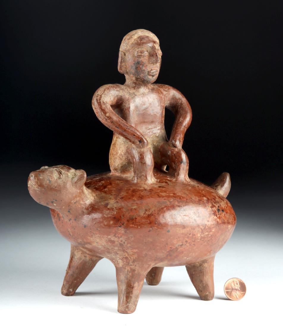 Colima Pihuamo Redware Sculpture - Man Riding a Dog: **Originally Listed At $1200** Pre-Columbian, West Mexico, Colima, Pihuamo Style, ca. 300 BCE to 300 CE. A skillfully hand-built and modeled redware sculpture depicting a man sitting upon the back of