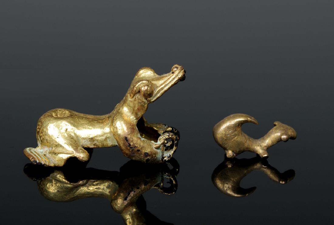 Pre-Columbian Tumbaga Gold Pendants - 7.8 g: **Originally Listed At $400** Pre-Columbian, Central America, Panama or Costa Rica, ca. 1000 to 1500 CE. A pair of zoomorphic tumbaga (alloy mostly of gold and copper) pendants, the larger representin