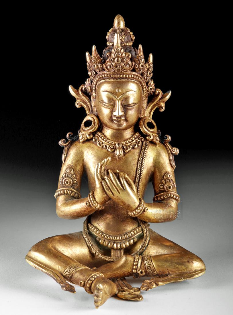 19th C. Tibetan Gilt Brass Seated Bodhisattva: Central Asia, Tibet, ca. 19th century CE. A beautiful gilt brass seated bodhisattva, delicately executed and cast with excellent detail. He wears armlets, bracelets, and anklets, as well as a necklace