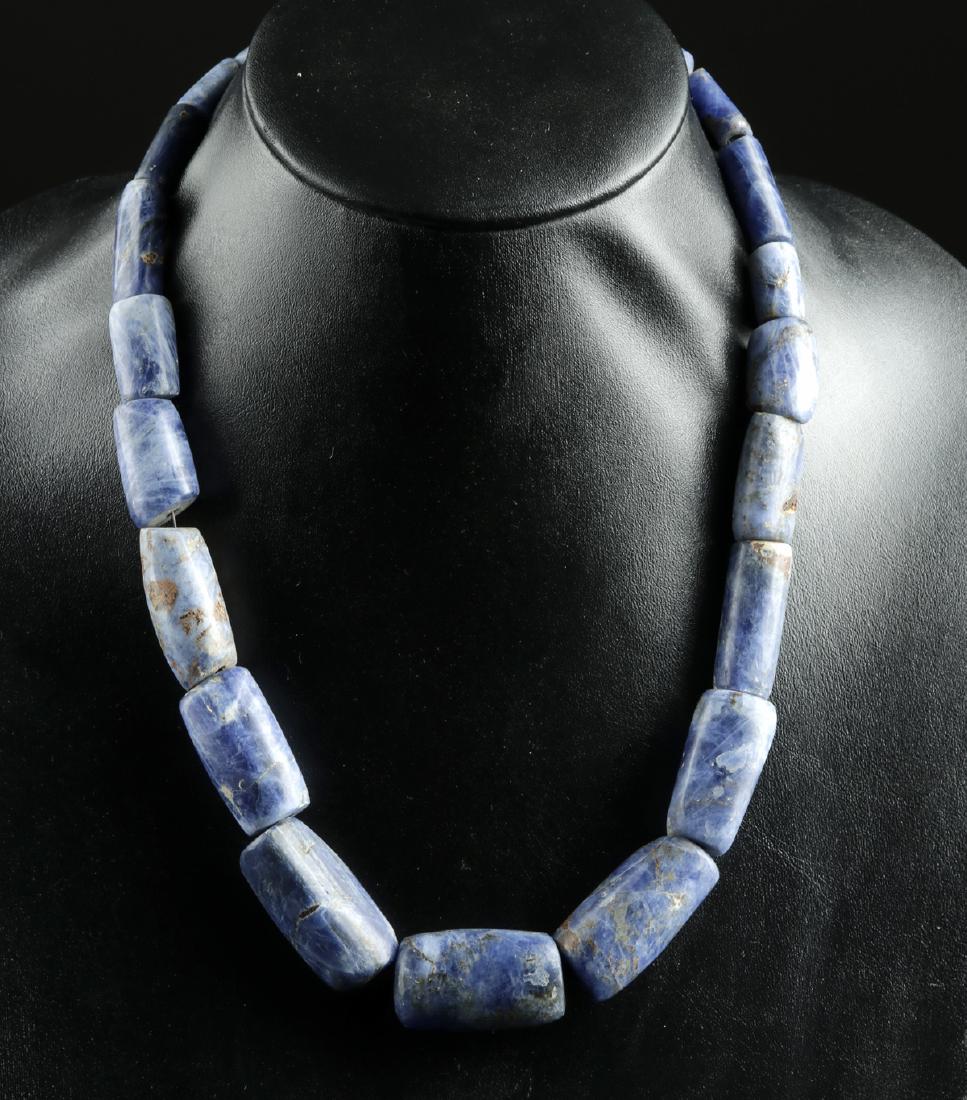 Fine Chavin Sodalite Bead Necklace: **Originally Listed At $600** Pre-Columbian, North Coast Peru, Chavin culture, ca. 900 to 200 BCE. A fabulous necklace composed of 23 cylindrical beads carved from vivid cornflower-blue sodalite with