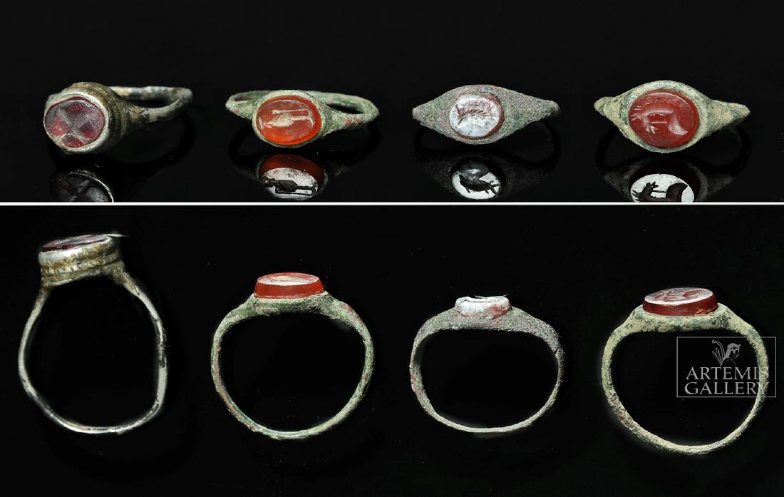 Lot of 4 Roman Bronze / Silver Carnelian Intaglio Rings: 100% of the Hammer price of all lots sold in this auction will be donated to the Walk to End Alzheimer's Disease, the world's largest event to raise awareness and funds for Alzheimer's care, support a