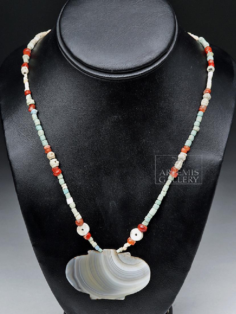 Ancient Sumerian Faience, Stone, & Agate Necklace: 100% of the Hammer price of all lots sold in this auction will be donated to the Walk to End Alzheimer's Disease, the world's largest event to raise awareness and funds for Alzheimer's care, support a