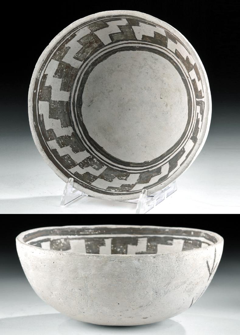 Anasazi Black-on-White Bowl Loaned to Mesa Verde Museum: Native American, Southwestern USA, Colorado, Anasazi/Ancestral Puebloans, ca. 1200 to 1300 CE. A beautiful seed bowl, made from a white/grey mineral paste clay by women artisans. The interior is ringe