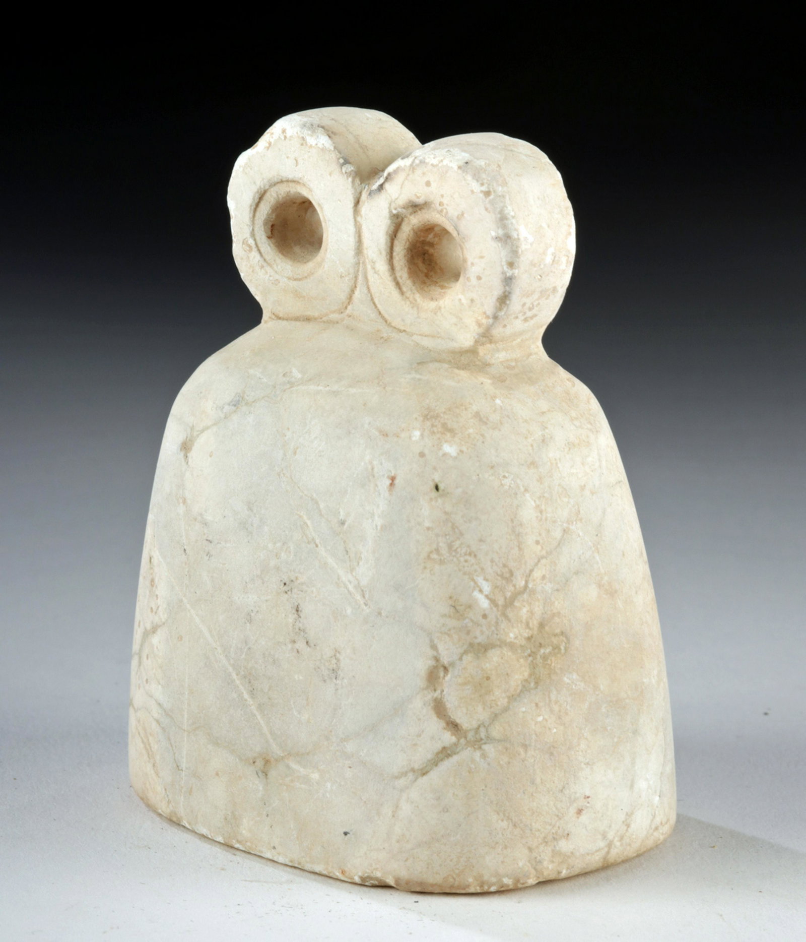 Tel Brak Stone Eye Idol: Ancient Near East, Tel Brak, modern day Syria, Late Uruk Period, ca. 3300 to 3000 BCE. Hand-carved and string cutting from a white stone, a wonderful example of one of the most famous artifacts from e