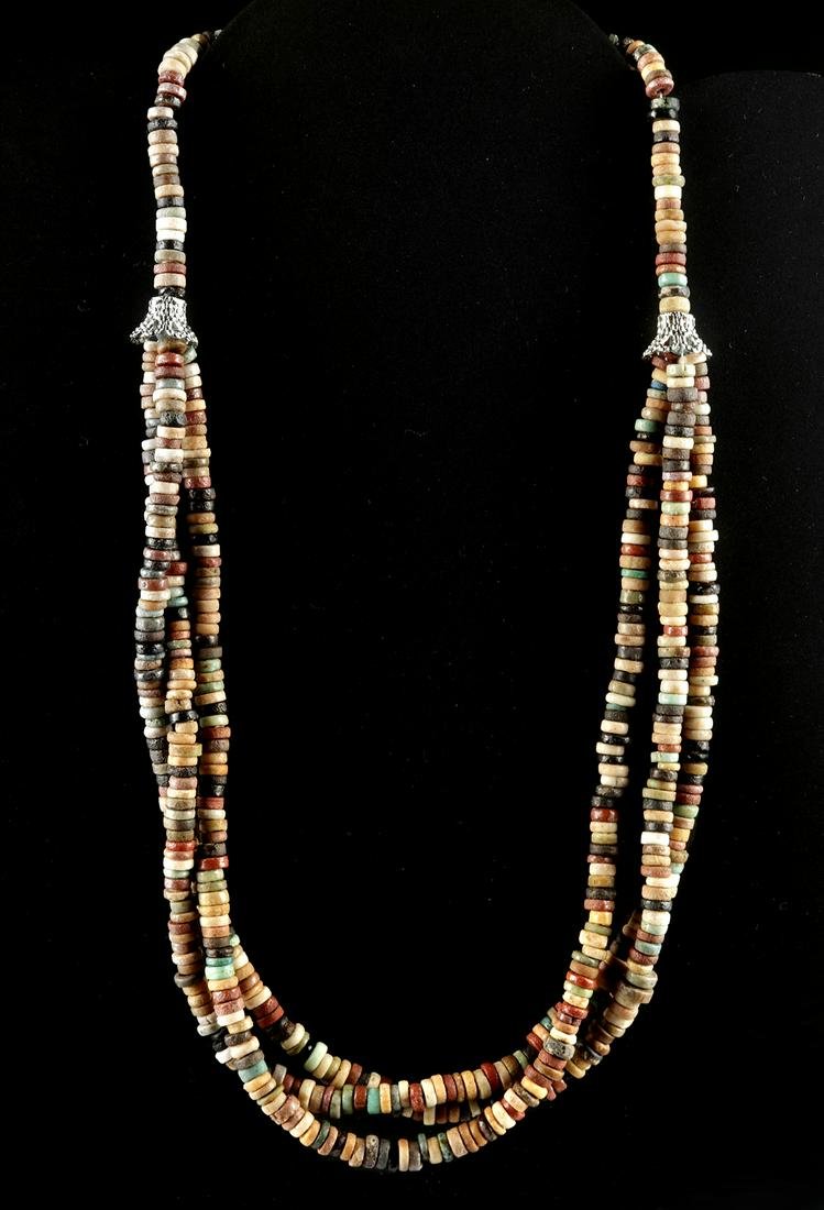 Egyptian Faience Beaded Necklace - Three Strands: Ancient Egypt, Third Intermediate to Late Dynastic Period, ca. 1070 to 332 BCE. A fabulous necklace of a wearable form comprised of hundreds of petite faience seed beads that are glazed in a variety o