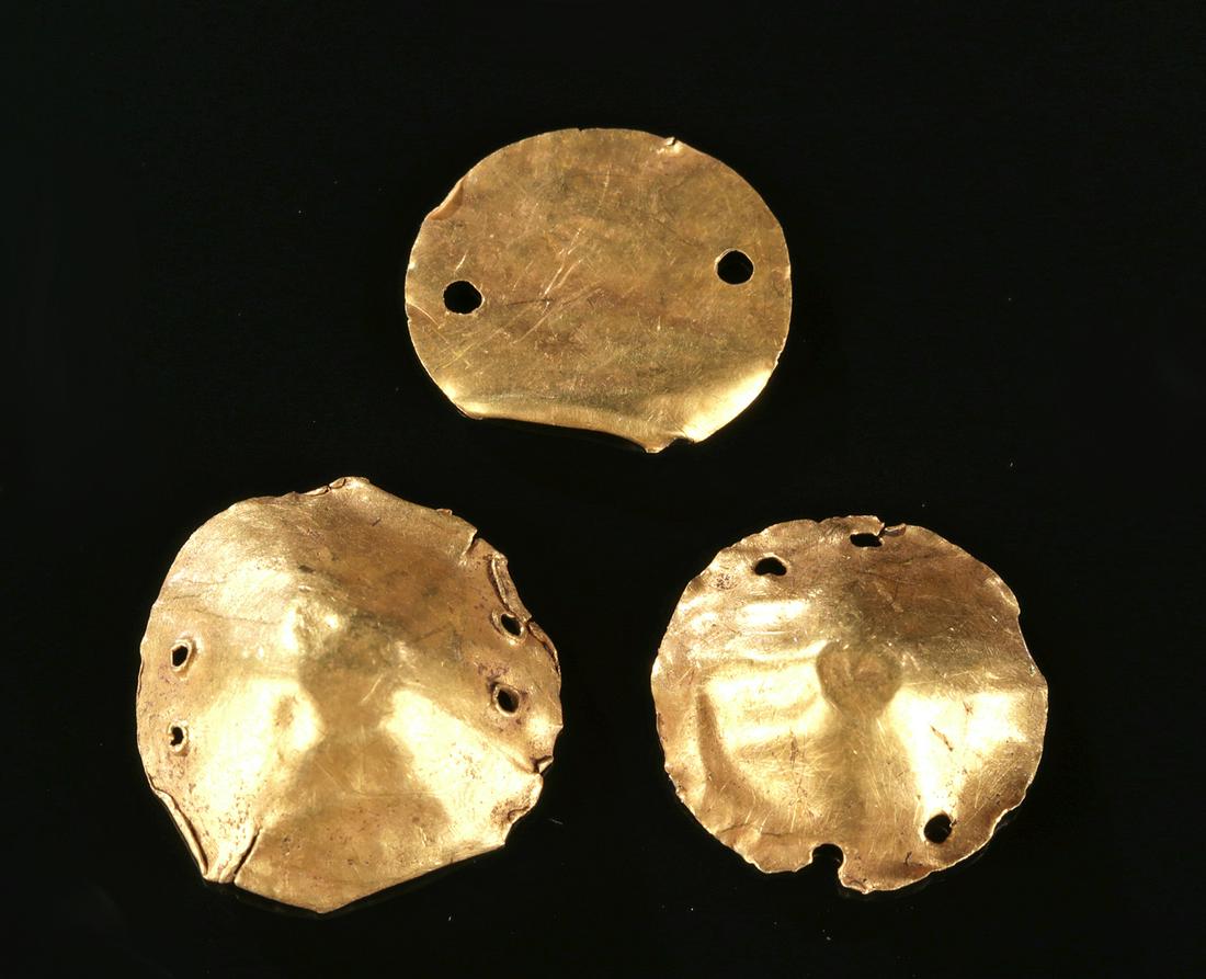 Lot of 3 Greek Hellenistic Gold Ornaments - 1.9 g: Greek, Hellenistic Period, ca. 3rd to 1st century BCE. A trio of beautiful gold (95% gold, equivalent to 22K+) ornaments. One is a gold foil disc, the other two made from slightly thicker gold hammere