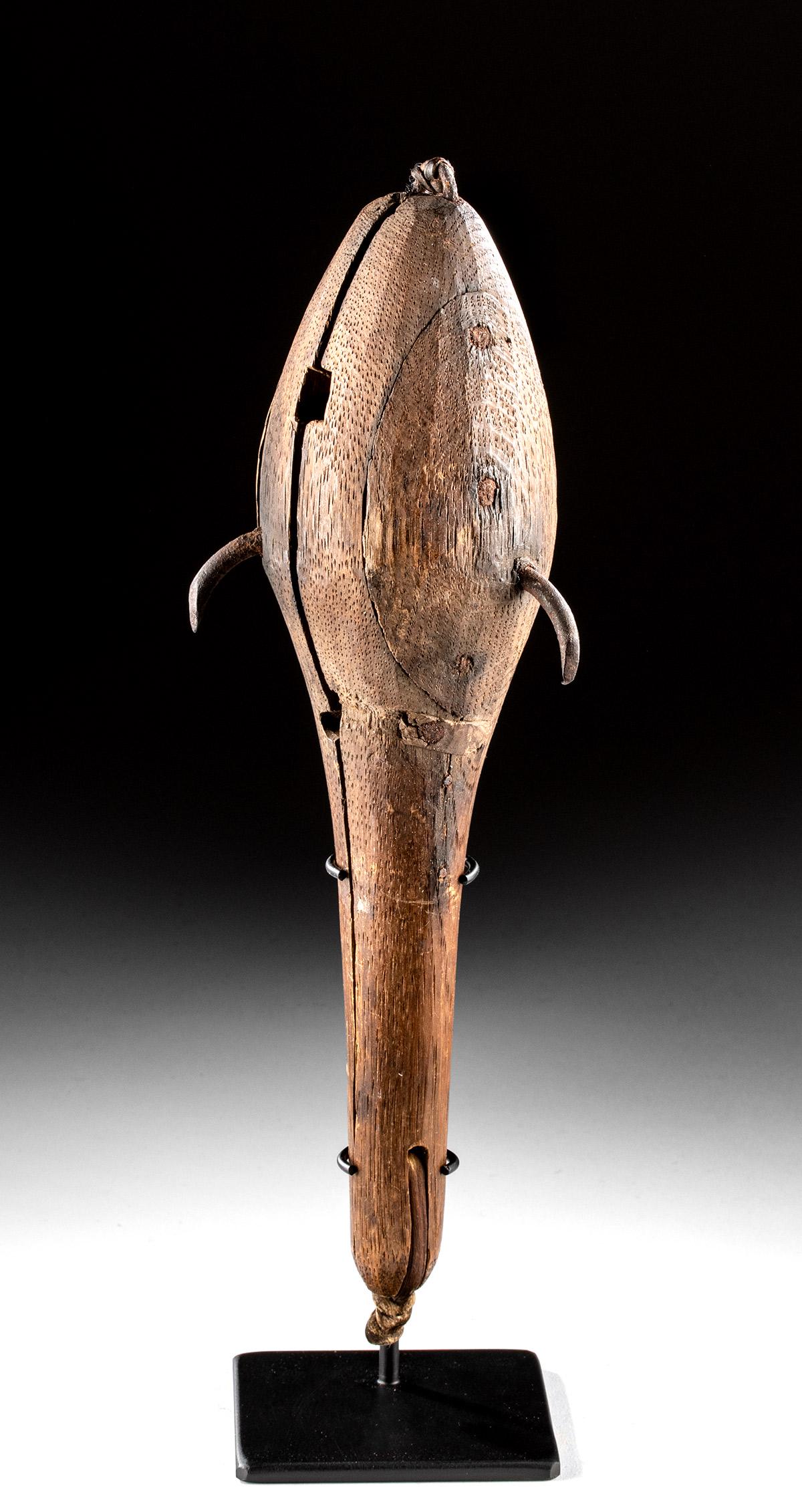 Early 20th C. Inuit Wood & Iron Seal Retrieval Hook: Native American/First Nations, Canada and Greenland, Inuit people, ca. early 20th century CE. A fascinating wooden object embedded with three sharp iron hooks, sometimes known as an "ingeelok", used f