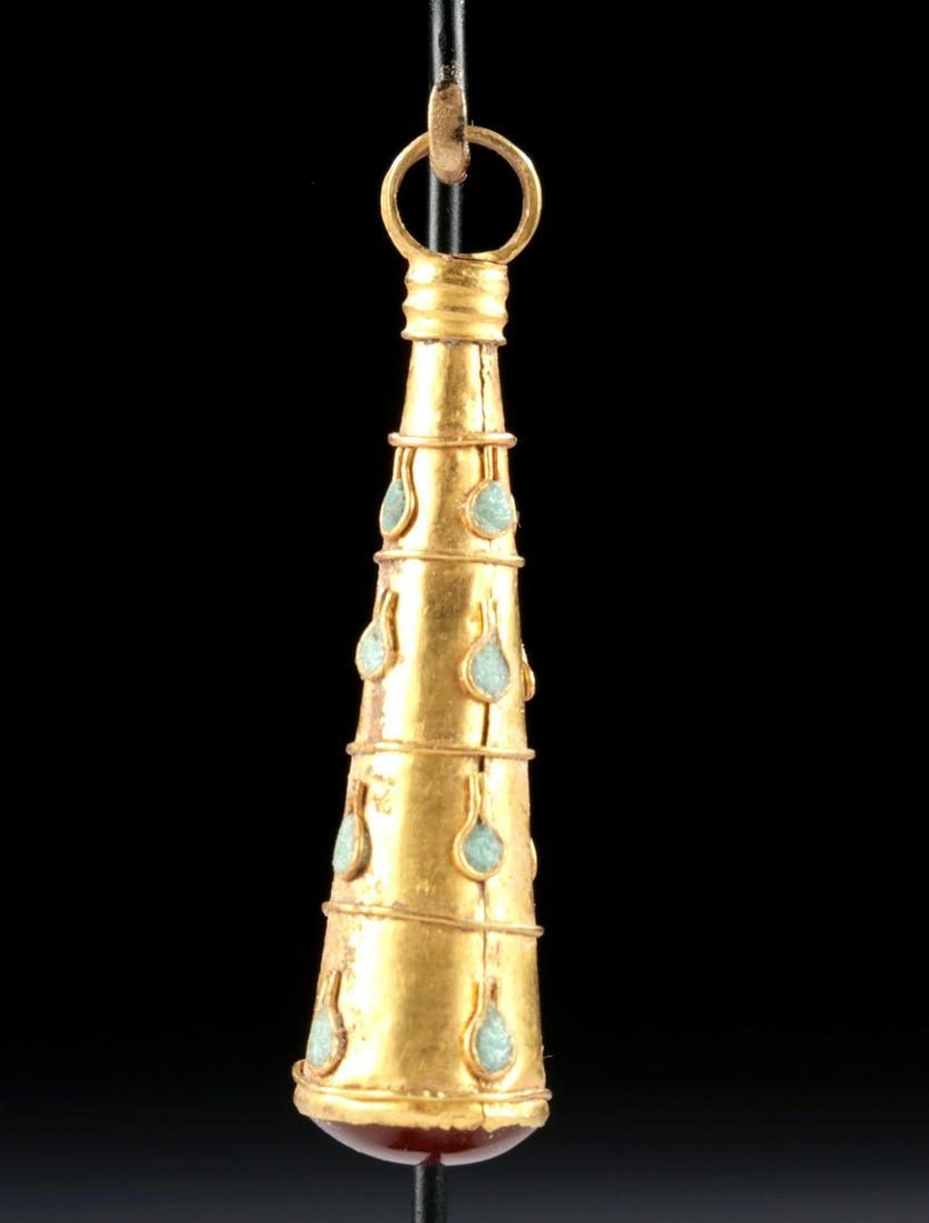 Roman 20K+ Gold, Turquoise, & Carnelian Hercules Club: Roman, Imperial Period, ca. 2nd to 3rd century CE. A very fine Hercules' (Greek Herakles and Heracles) club pendant comprised of fine 20K+ gold sheet (86% gold) adorned with filigree bands and 13 tear