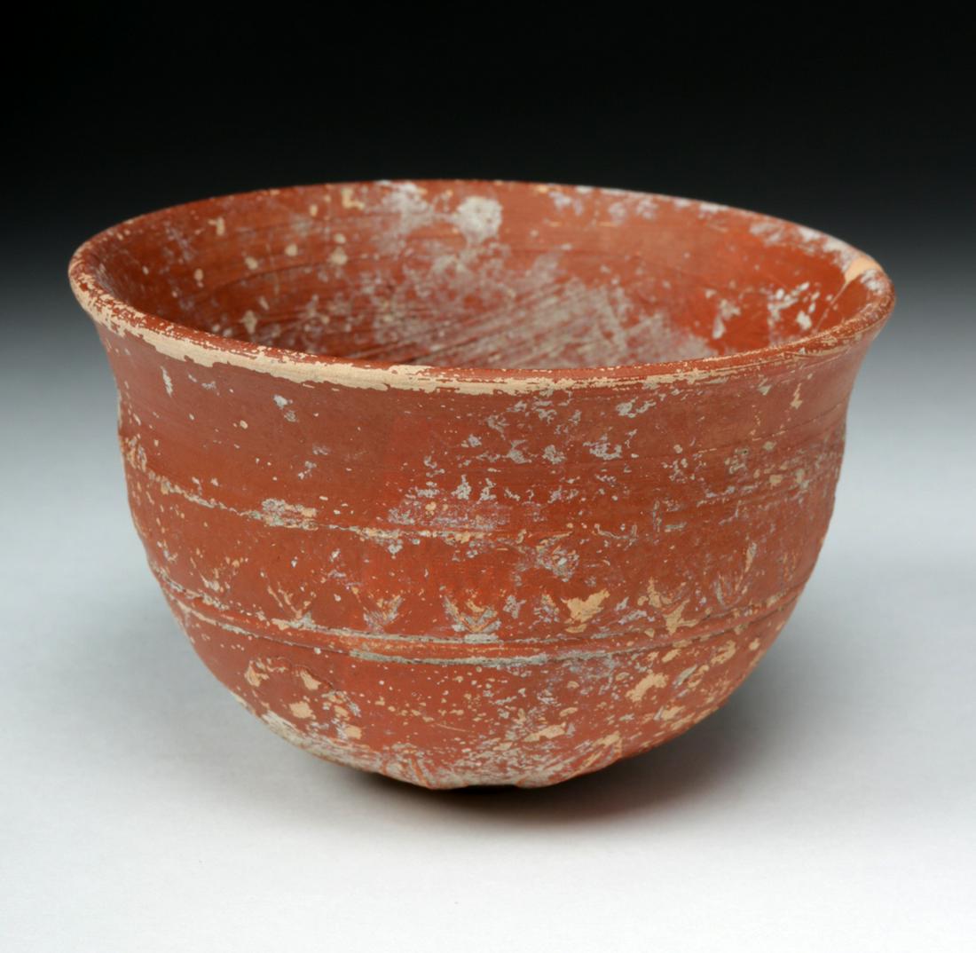 Greek Hellenistic Megarian Pottery Redware Cup: **First Time At Auction** Greece, Hellenistic Period, ca. late 3rd to 1st century BCE. A lovely redware pottery bowl with a deep red color and a stamped design around the exterior, centered on the bas