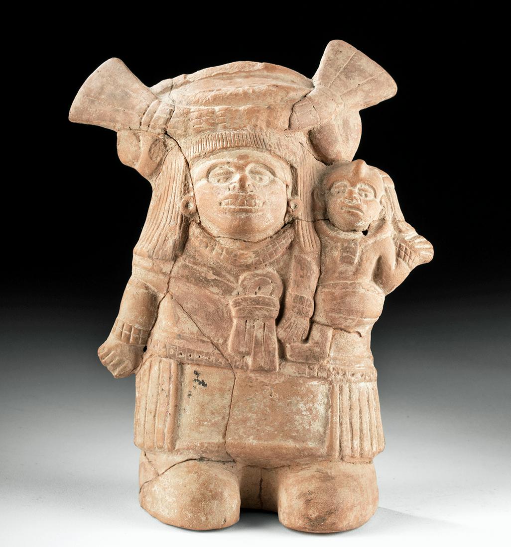 Veracruz Pottery Standing Figure - Mother & Child: **First Time At Auction** Pre-Columbian, Gulf Coast Mexico, Veracruz (Vera Cruz), ca. 3rd to 7th century CE. A large, mold-formed pottery figure depicting a mother holding her child in one arm. The wo