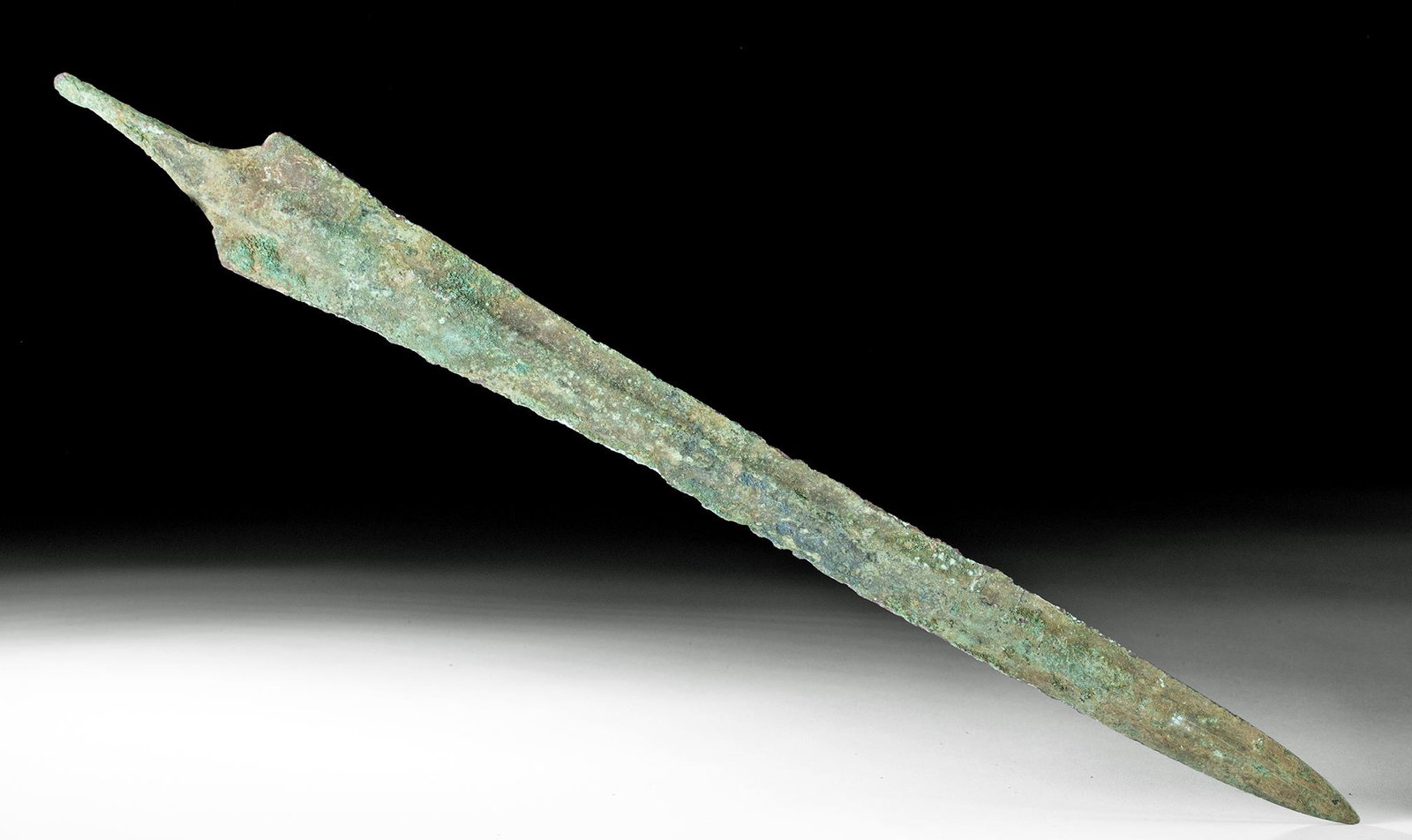 Luristan Bronze Short Sword - 18" Long: **First Time At Auction** Ancient Near East, northwestern Iran, Luristan, ca. 1000 to 600 BCE. A fine bronze short sword made by highly-trained urban artisans using the lost wax (cire perdue) casting