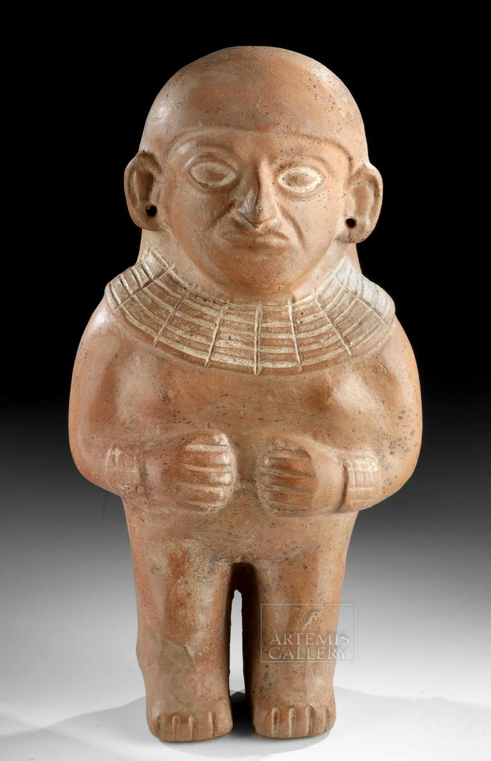 Moche Redware Standing Female Figure: **Originally Listed At $450** Pre-Columbian, North Coast Peru, Moche, ca. 500 to 800 CE. A fabulous hollow-built and highly-burnished terracotta woman standing upon delineated legs and broad feet. She