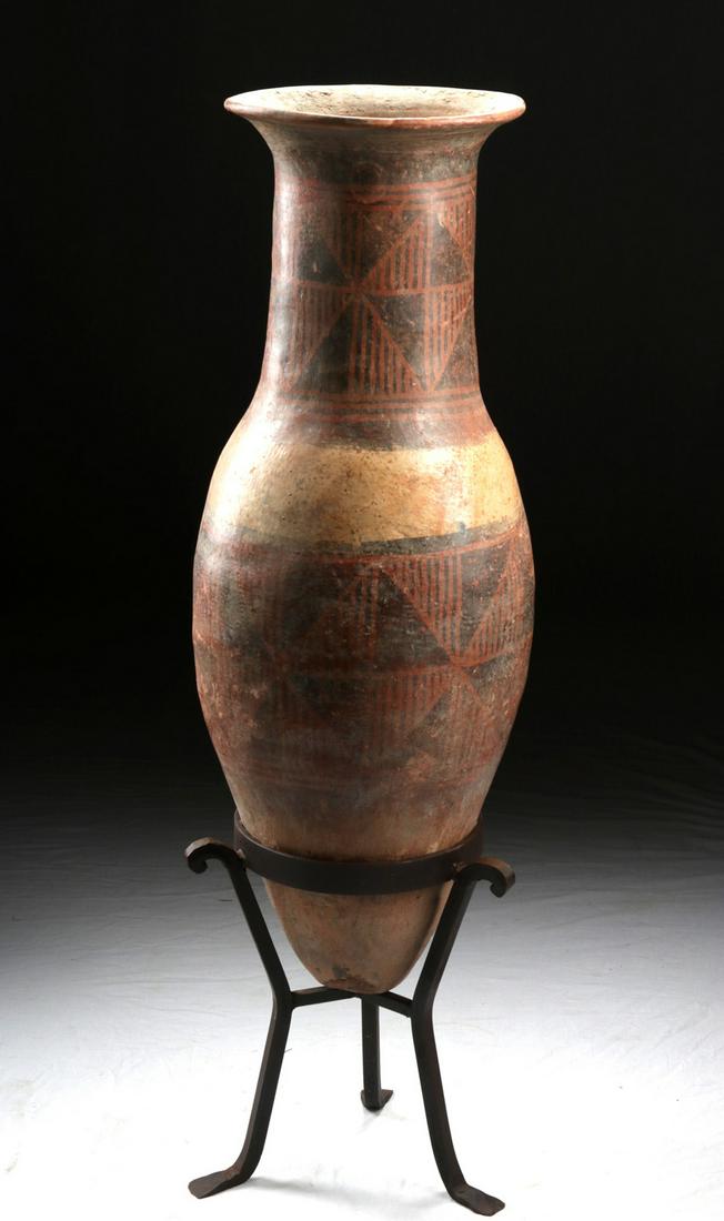 Narino Polychrome Bullet Amphora, ex-Vic Damone: **Originally Listed At $1400** Pre-Columbian, Colombia, Carchi-Narino Highlands, Narino culture, ca. 500 to 1000 CE. A beautiful ceramic amphora of a classic "bullet" style finished with a highly-burn