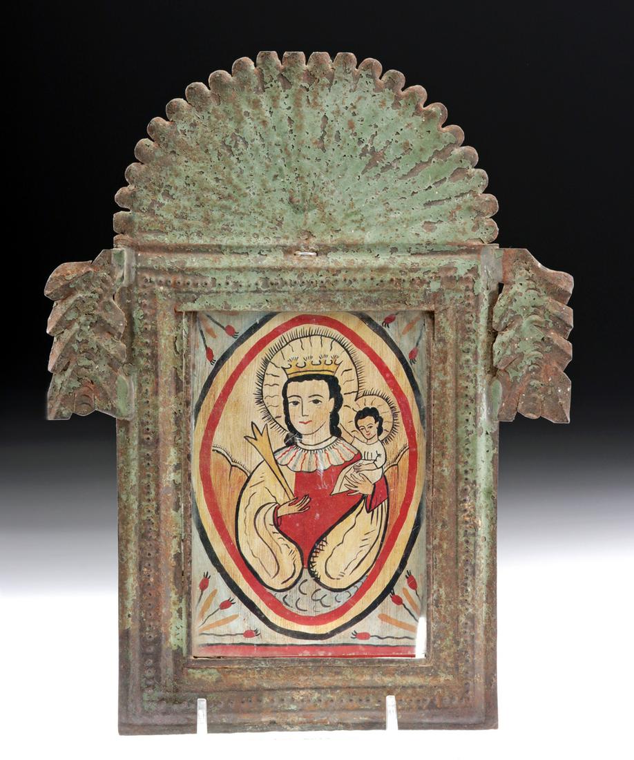 19th Century New Mexican Tin Nicho: New Mexico, ca. 19th century CE. A charming antique New Mexican tin nicho comprised of a rectangular frame with a 'beaded' border, attachments in the form of leaf-like motifs adorning the upper corner