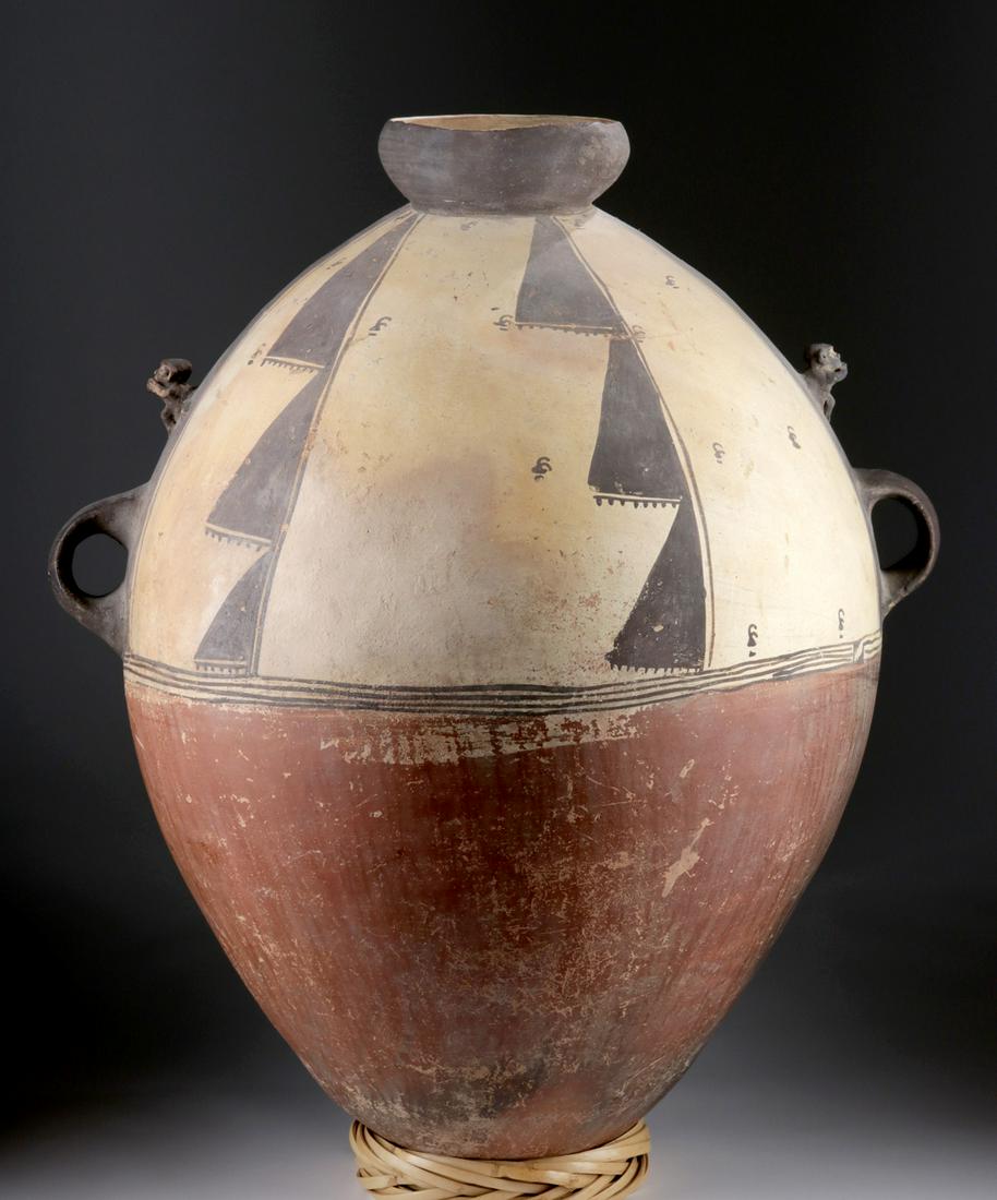 Monumental Chancay Polychrome Vessel - TL Tested: Pre-Columbian, Central Coast Peru, Chancay, ca. 800 to 1200 CE. A massive ceramic vessel, egg-shaped and with a thick rolled mouth and rim, with a beautiful geometric decorative program. Aside from it