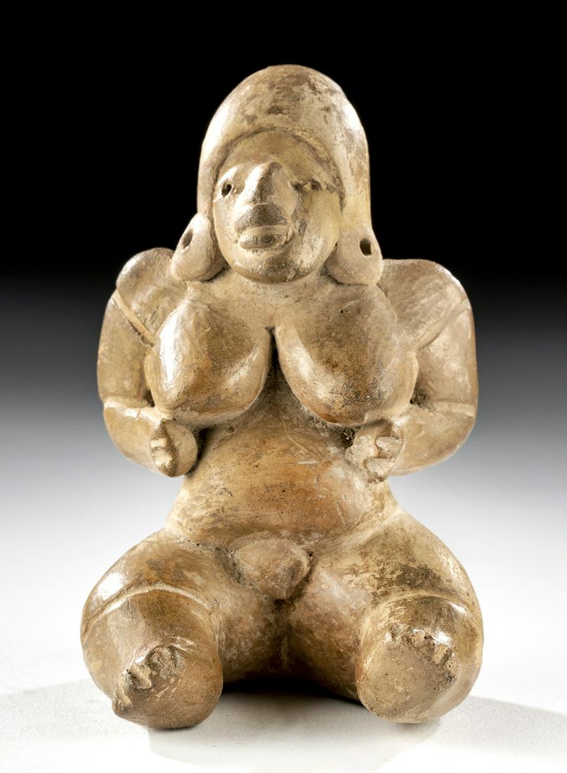 Veracruz Huastec Pottery Female Venus Figure: Pre-Columbian, Gulf Coast region of Mexico, northern Veracruz, Huastec culture, ca. 900 to 1450 CE. A hand-built and highly burnished female 'Venus' figure, so-called because of her voluptuous feminin