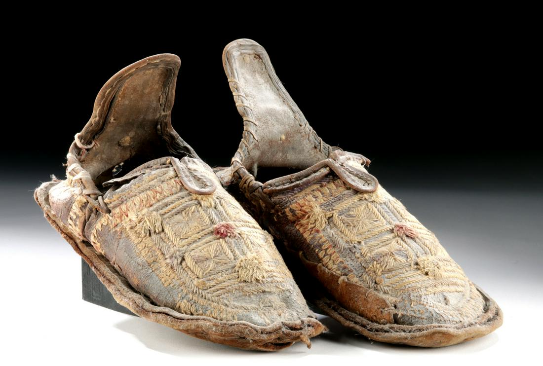 12th C. Moroccan Berber Leather & Silk Shoes (pr): Ancient Northwest Africa, Morocco, Almohad to Marinid Dynasties, Berber people, ca. 12th to 13th century CE. A rare and delicate pair of sturdy shoes with soles formed from two sewn leather pads. The 