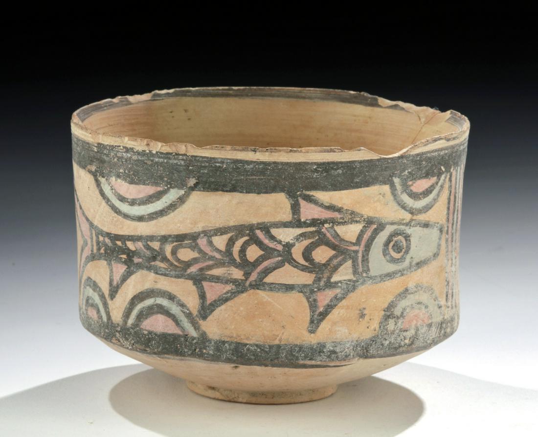 Indus Valley Polychrome Jar w/ Fish: Ancient Central Asia, Indus Valley, Harappan/Mohenjo-Daro civilization, ca. 2700 to 2000 BCE. A wheel-thrown pottery jar with a protruding circular foot, a wide body, tall walls with a slightly flared