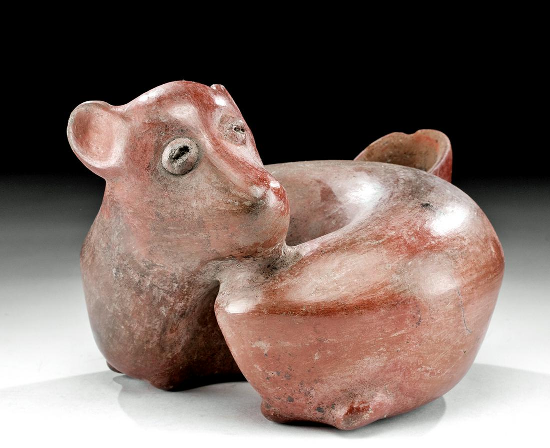 Colima Redware Effigy Vessel - Cute Resting Dog: Pre-Columbian, West Mexico, Colima, Protoclassic period, ca. 100 BCE to 250 CE. A hand-built and highly burnished redware pottery vessel with a flat base, a horseshoe-shaped body, and a raised head op