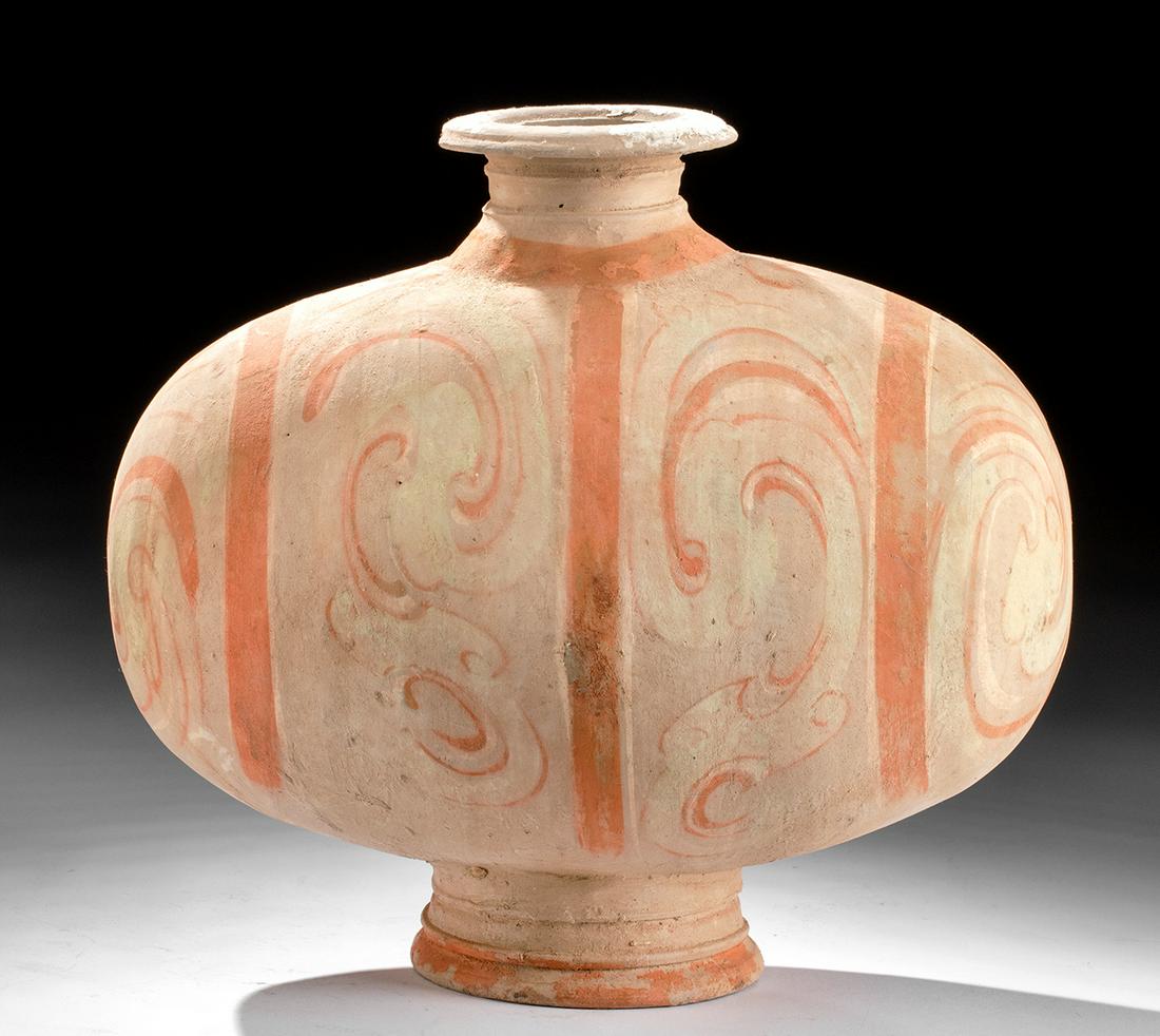 Chinese Han Polychrome Cocoon Vessel: East Asia, China, Western Han Dynasty, ca. 206 BCE to 220 CE. A handsome polychrome cocoon vase presenting a traditional egg-shaped, footed form with a flared spout rising from the center of the upper