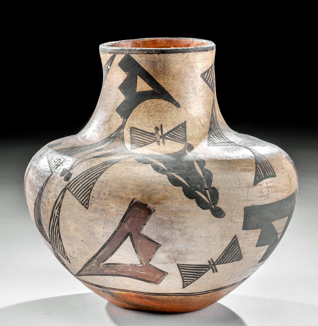Early 20th C. Native American Acoma Pottery Jar: Native American, Acoma / Laguna, Northern Arizona or New Mexico, ca. 1920s to 1930s CE. A beautiful polychrome, curvaceous olla with hand built with remarkably thin walls created via the coil-and-scra