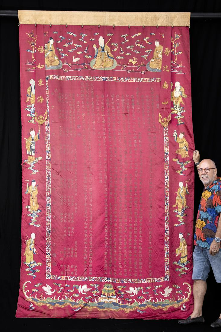 18th C. Chinese Silk Tapestry w/ Taoist Imagery & Text: East Asia, China, ca. late 18th to early 19th century CE. A very large Chinese silk tapestry of a beautiful apple red color with elaborate embroidery (including gold threads). The central panel featur