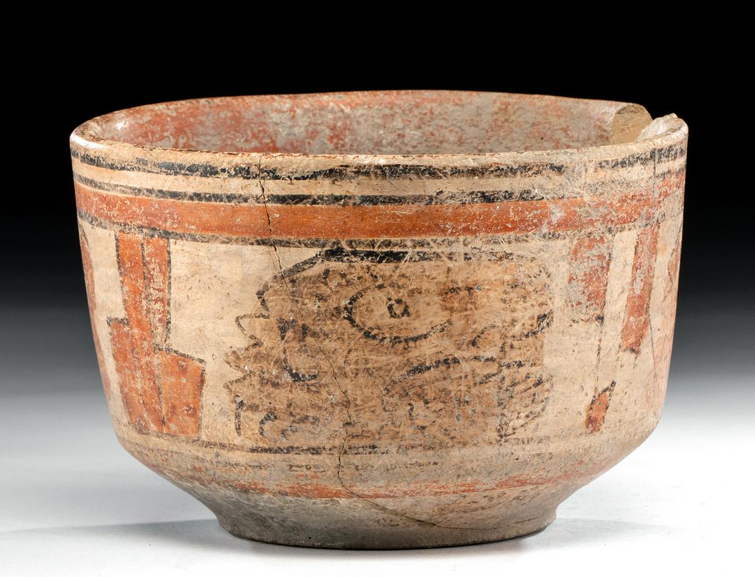 Maya Peten Polychrome Bowl w/ Faces, ex-Stendahl: Pre-Columbian, Guatemala, Peten Basin, Maya, Late Classic Period, ca. 550 to 900 CE. A hand-built pottery bowl displaying four abstract faces enclosed within thick red bars. The vessel has a flat base