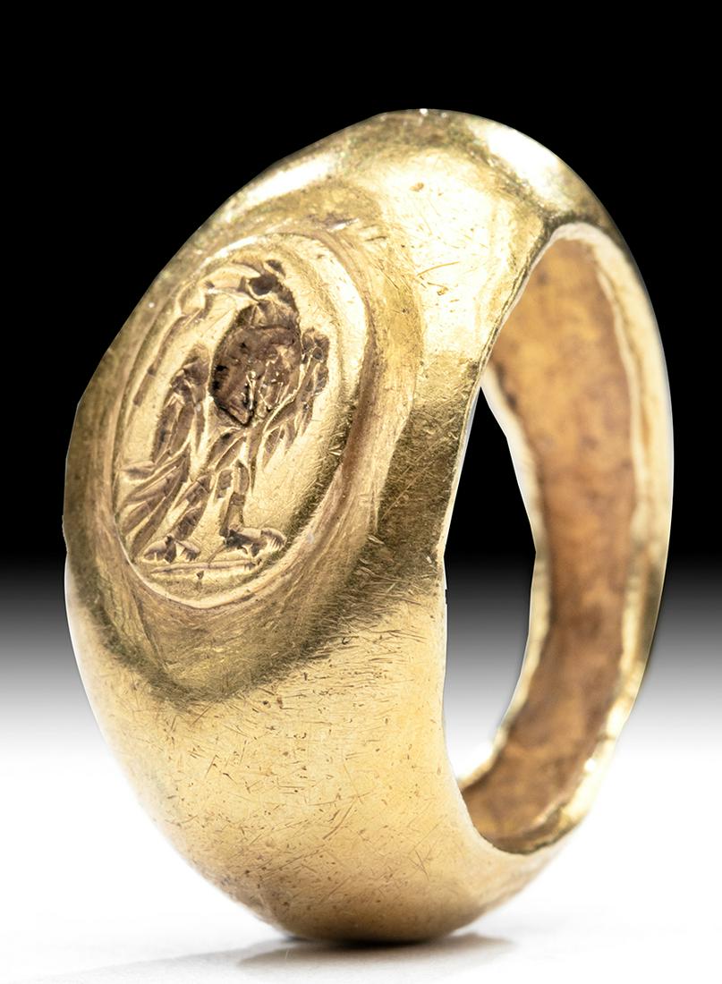 Roman 18K+ Gold Signet Ring - Imperial Eagle: **Originally Listed At $1400** Roman, Imperial Period, ca. 2nd century CE. A beautiful gold signet ring with a large oval face featuring an intaglio depicting an imperial eagle, symbol of the Roman le
