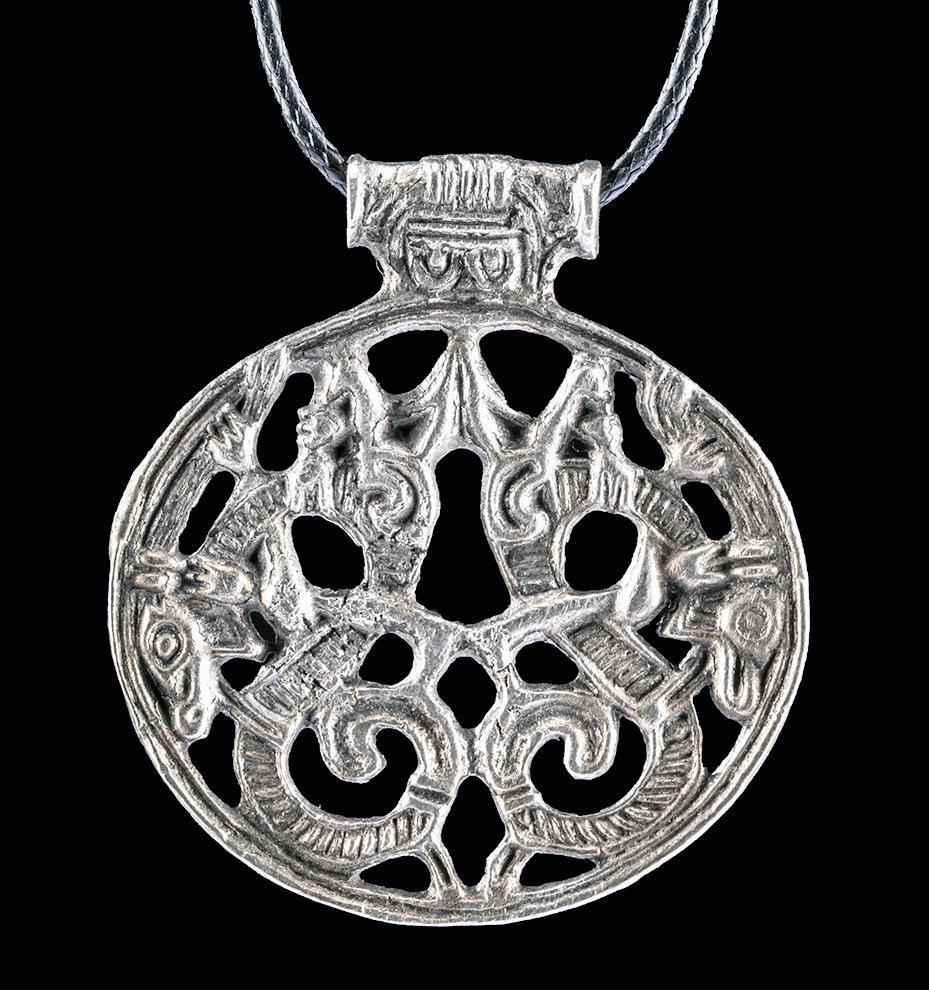 Viking Silver Pendant - Serpents / Jormungandr: **Originally Listed At $600** Northern Europe, Viking or Norse culture, ca. 8th to 10th century CE. A beautiful pendant of an ovoid form, comprised of high-grade (89%) silver, depicting a pair of enor