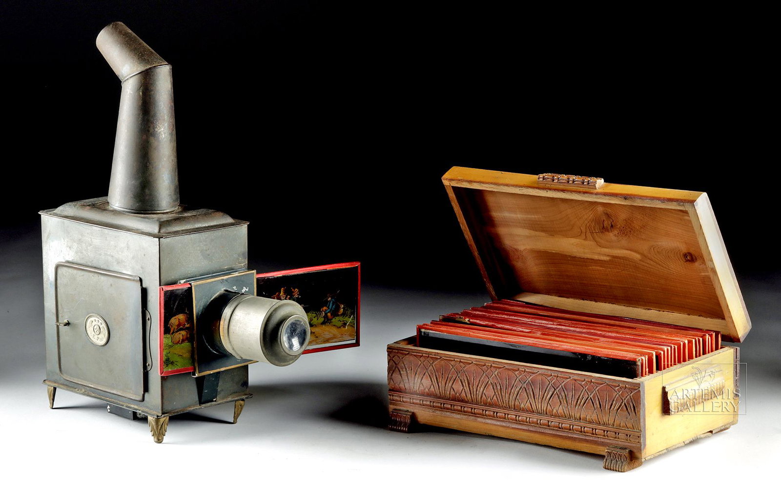 Ernest Plank Magic Lantern & Box of Hand Painted Slides: **Originally Listed At $600** Europe, Germany, Ernest Plank Company, ca. late 19th century CE. A wonderful Magic Lantern - an early form of image projector that used pictures painted on glass slides t