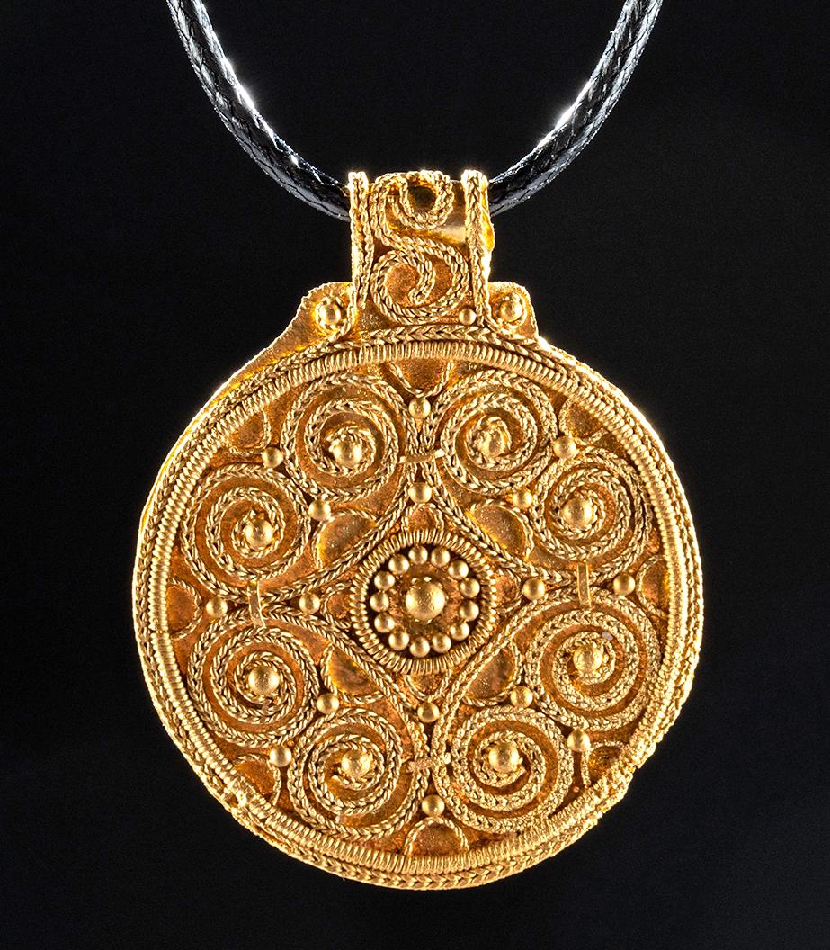 Viking 22K+ Gold Bracteate Pendant - 6.2 g: Northern Europe, Viking, ca. 9th to 11th century CE. Wow! A large, truly stunning 98% gold (equivalent to 22K+) bracteate pendant of circular form with a symmetrical geometric composition featuring a 