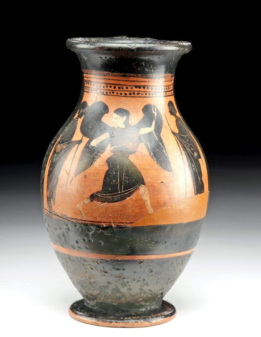 Greek Attic Olpe w/ Nike, ex-Museum, ex-Sotheby: Ancient Greece, Athens, ca. 500 BCE. A striking Attic black-figure olpe featuring Nike - the winged goddess of victory, speed, and strength - in composite profile, donning flowing garments with incise