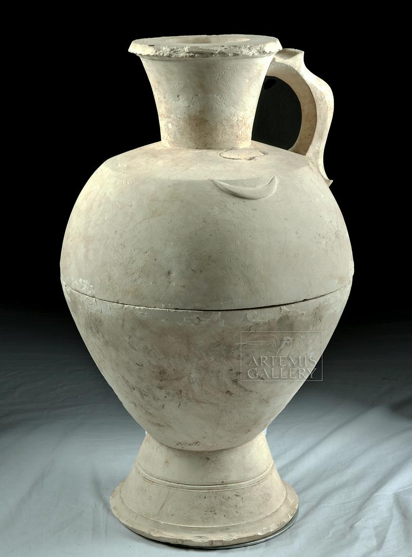 Huge Greco-Phoenician Stone Vessel - 1st Millennium!!: Ancient Eastern Mediterranean, Greco-Phoenician, ca. 6th to 5th century BCE. A huge white limestone vessel, created in two sections, with a graceful form. The body is piriform, with a broad shoulder w