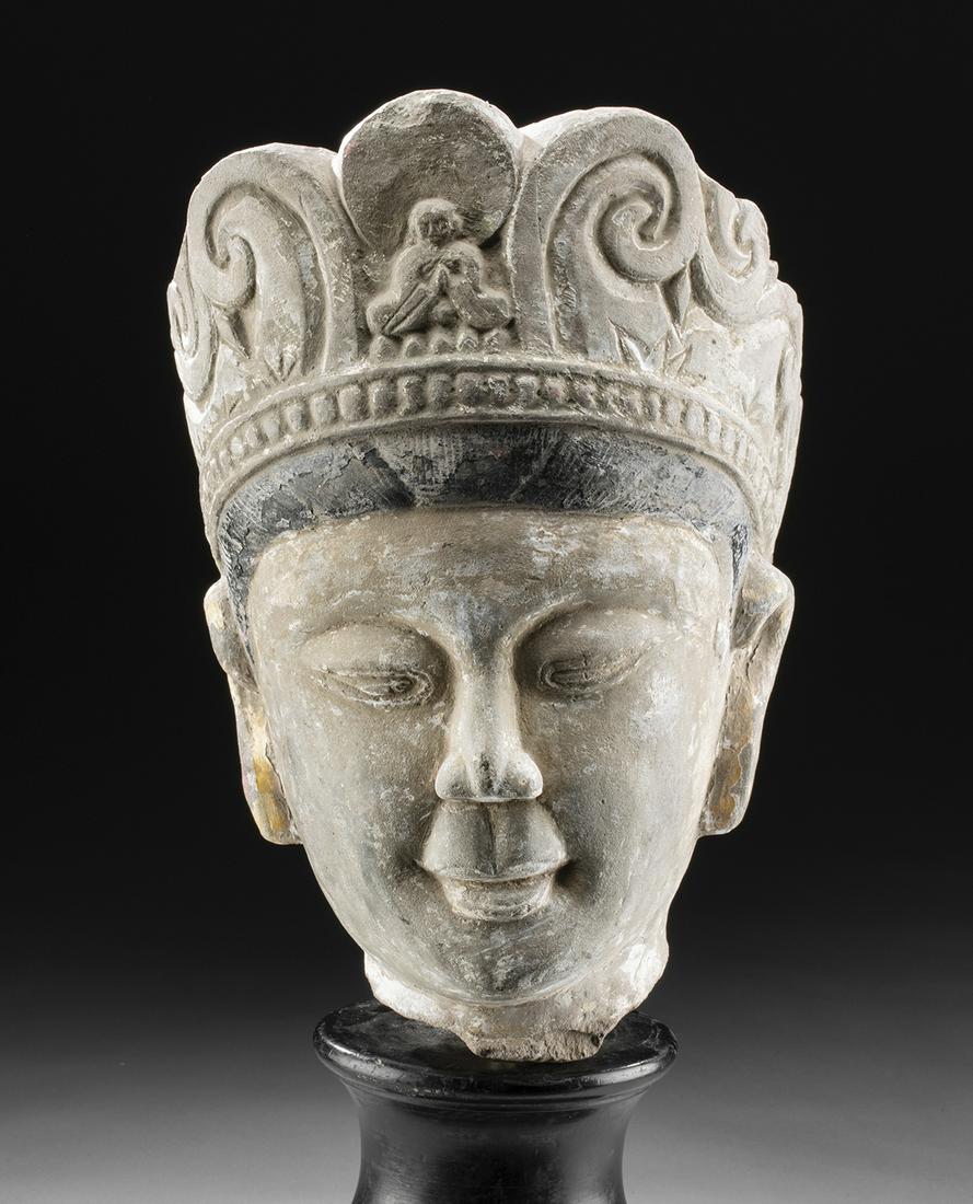 Chinese Ming Dynasty Stucco Head of Bodhisattva: East Asia, China, Ming Dynasty, ca. 1368 to 1644 CE. A striking stucco head depicting a bodhisattva donning an elaborate crown adorned with a central Buddha who is flanked by spiraling tendrils with a