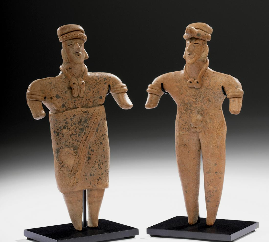 Lovely Matched Pair of Colima Redware Flat Figures: Pre-Columbian, West Mexico, Colima, Protoclassic period, ca. 100 BCE to 250 CE. A wonderful matched pair of hand-built redware pottery 'flat' figures, so-called because of their thin bodies and minima