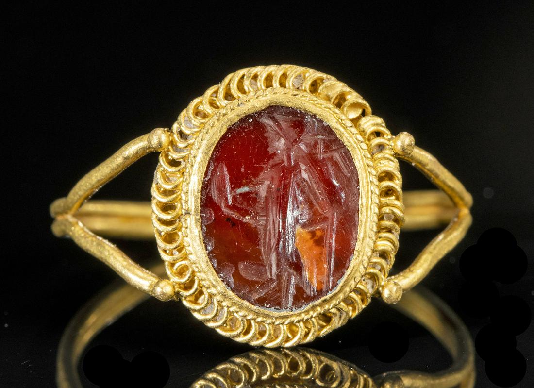 Roman 22K+ Gold Ring w/ Carnelian Intaglio of Mars: For every order (single or multiple lots) in this auction, Artemis Gallery will donate 25 meals to Community Food Share, a Feeding America Food Bank. Roman, Imperial Period, ca. 1st to 3rd century CE.