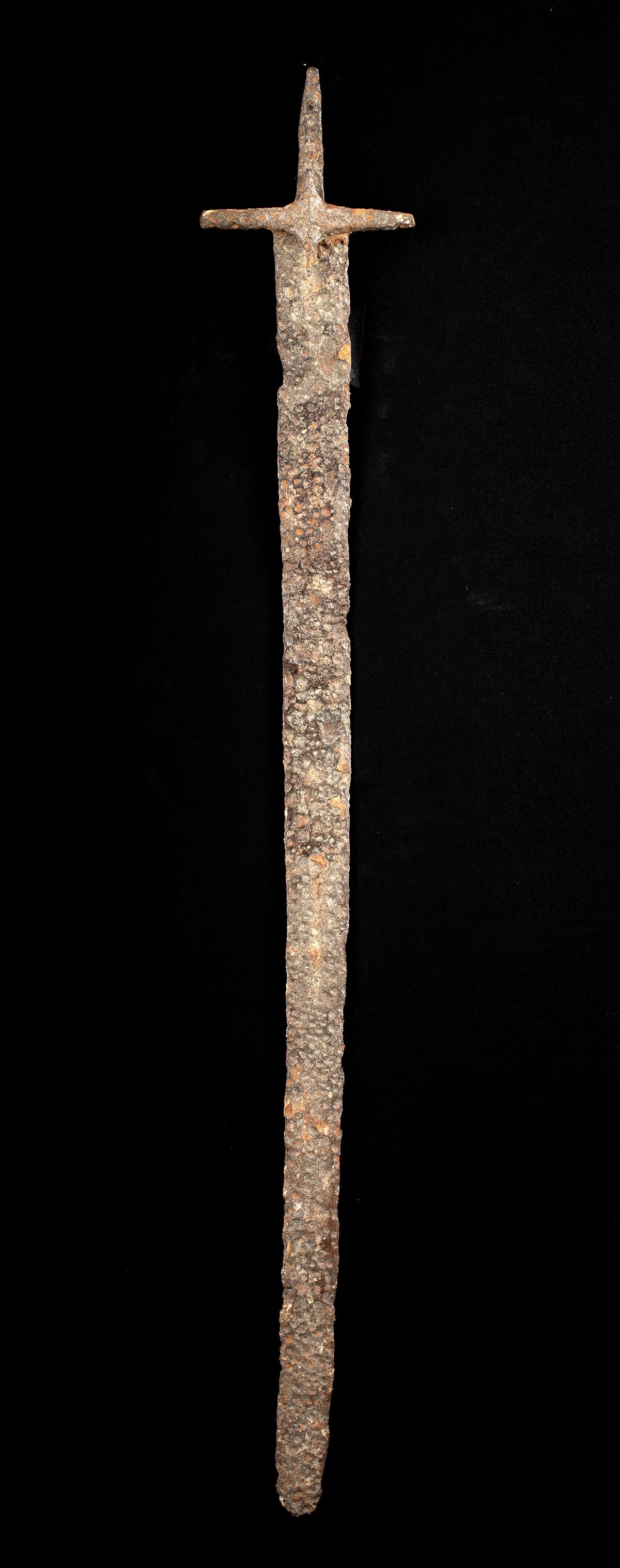 12th C. Byzantine Iron Paramerion / Sword: **Originally Listed At $1500** Near East / Holy Land, Byzantine Empire, ca. 12th to 13th century CE. A well preserved iron sword of the form known as paramerion, this example with the gentlest of curv