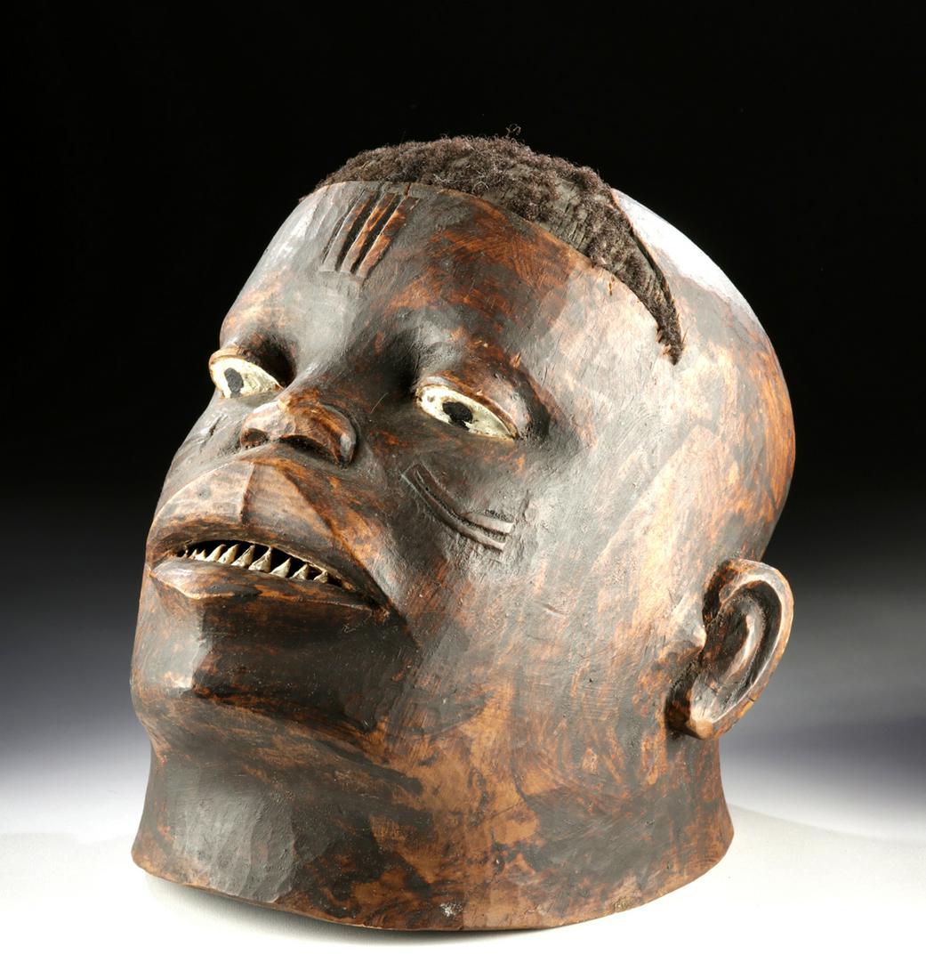 Expressive 20th C. African Makonde Wood Helmet Mask: **Originally Listed At $600** Southern Africa, Mozambique or Tanzania, Makonde peoples, ca. mid-20th century CE. A fine helmet mask carved from lightweight wood. The mask presents an expressive counte