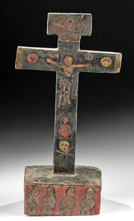 19th C. Mexican Painted Wood Animas Crucifix: Latin America, Mexico, ca. 19th century CE. A hand-carved and painted free-standing wood carving representing "La Cruz de las Animas" or "The Cross of Souls", this religious artwork is layered with