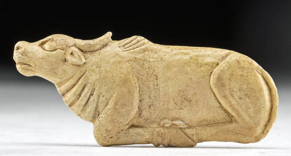 Fine Egyptian Bone Cosmetic Dish - Trussed Bull: Egypt, Late Dynastic to Ptolemaic period, ca. 664 to 30 BCE. A fascinating dish used for holding cosmetic substances, hand-carved from the bone of a bull. The bottom of the dish displays a bull with